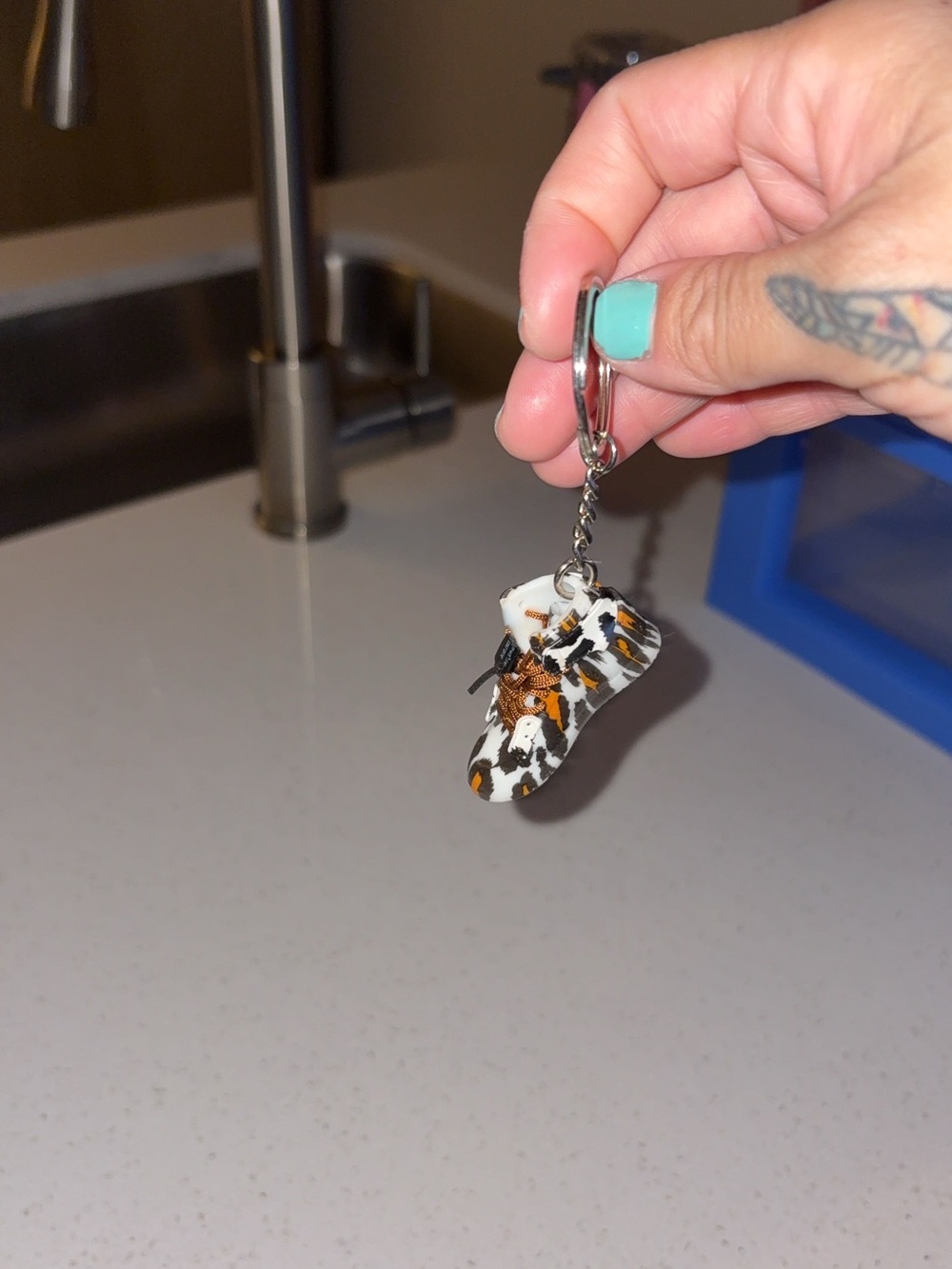 Nike Bird Toy Keychain in White, Black & Orange
